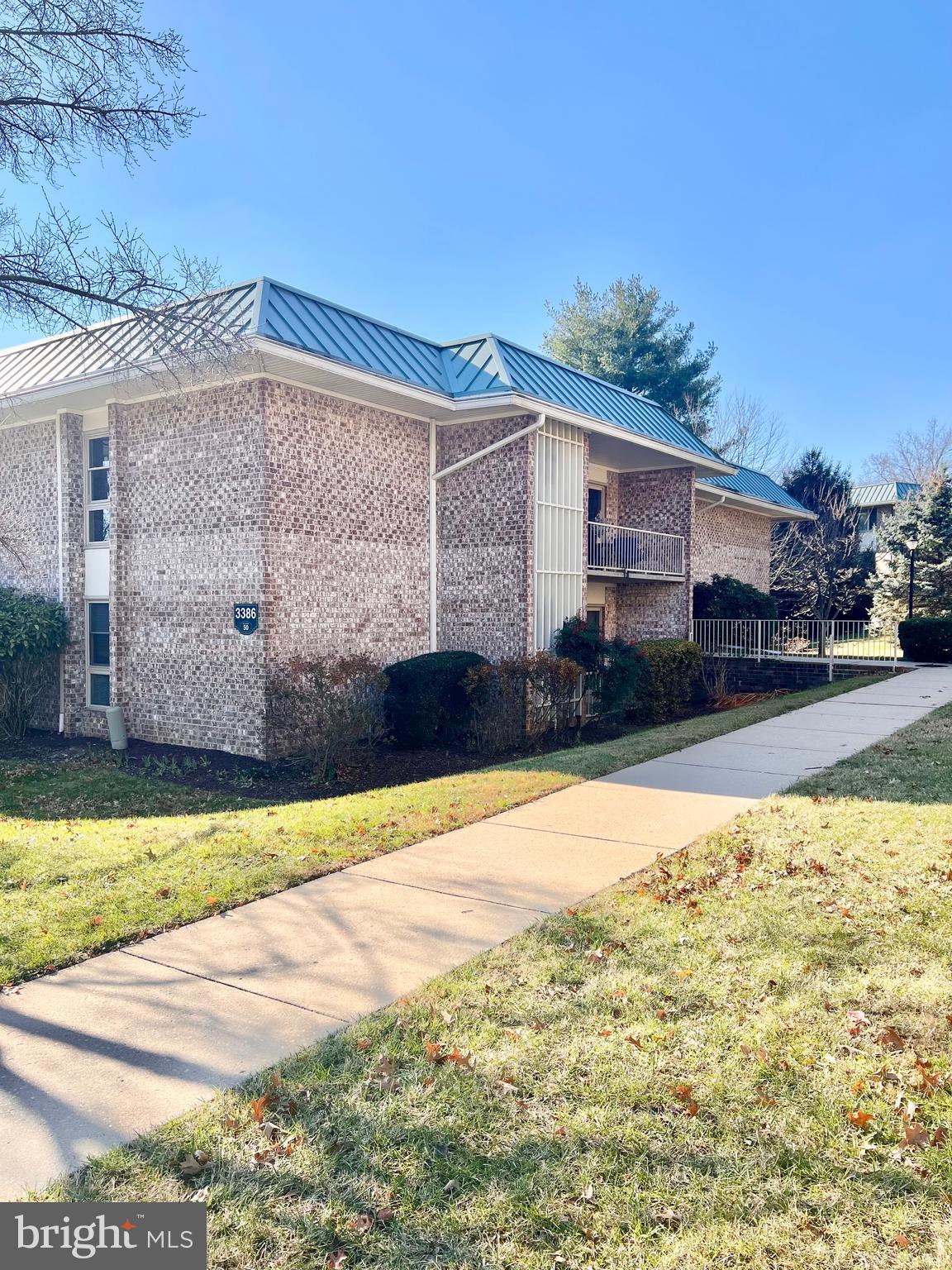 3386 Chiswick Court, Unit 501A Silver Spring, MD 20906 - Photo 23 of 43 a front view of a house with a yard