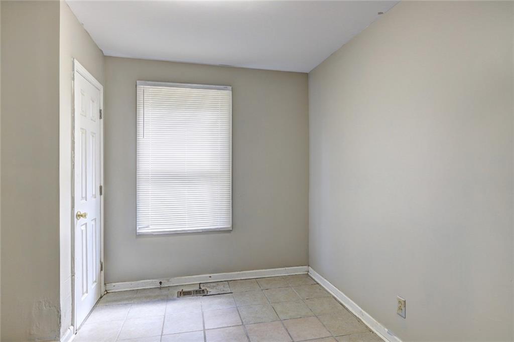 2122 Monroe Avenue Macon, GA 31204 - Photo 14 of 16 a view of an empty room with a window