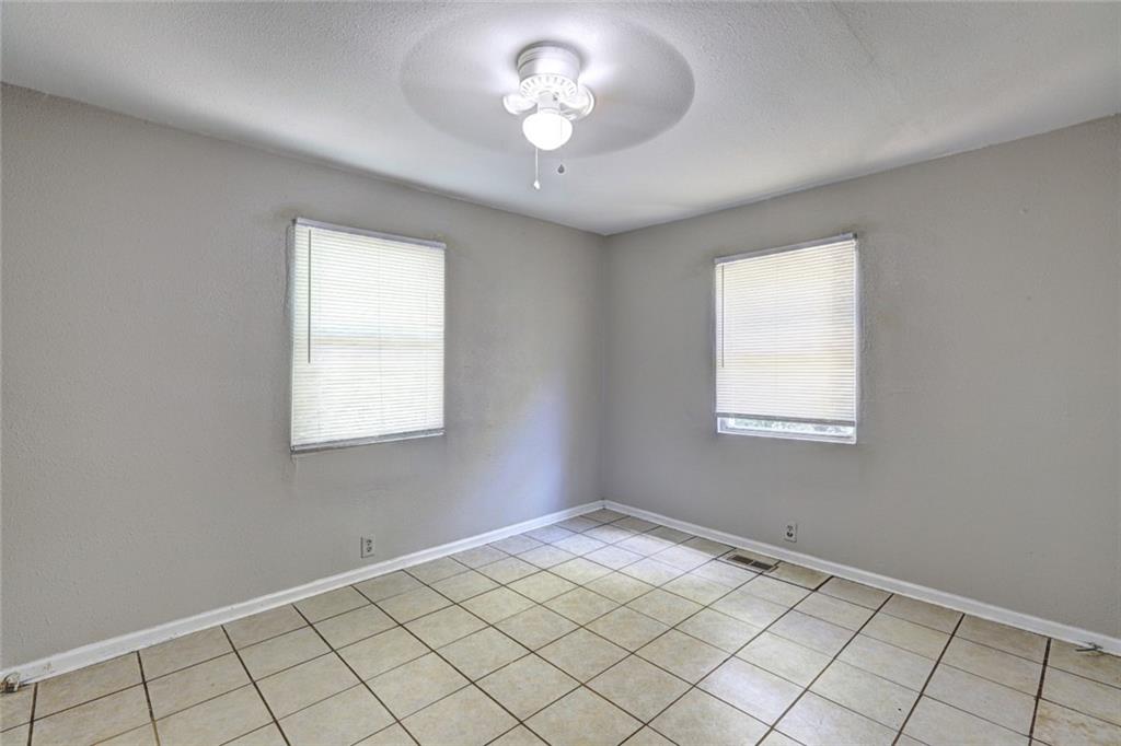 2122 Monroe Avenue Macon, GA 31204 - Photo 10 of 16 a view of an empty room and window