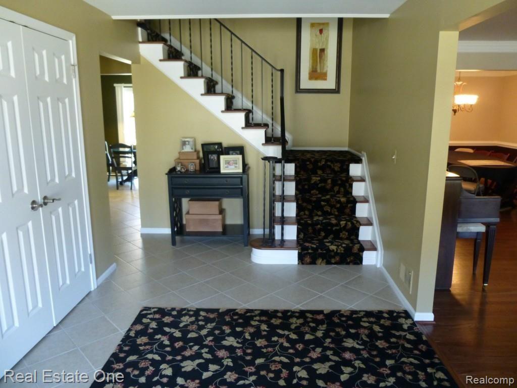 Foyer with area rug (included)