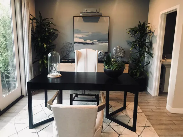 a view of a potted flower in a yard