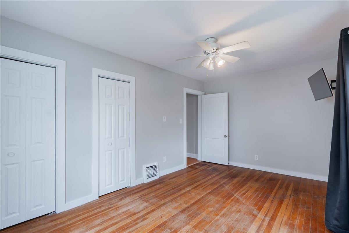 8 Felton Place Bloomington, IL 61701 - Photo 12 of 31 a view of empty room with wooden floor