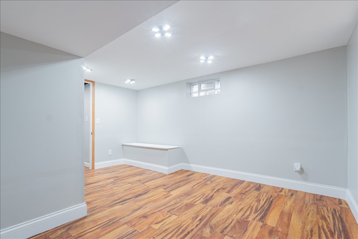 8 Felton Place Bloomington, IL 61701 - Photo 19 of 31 a view of empty room with wooden floor