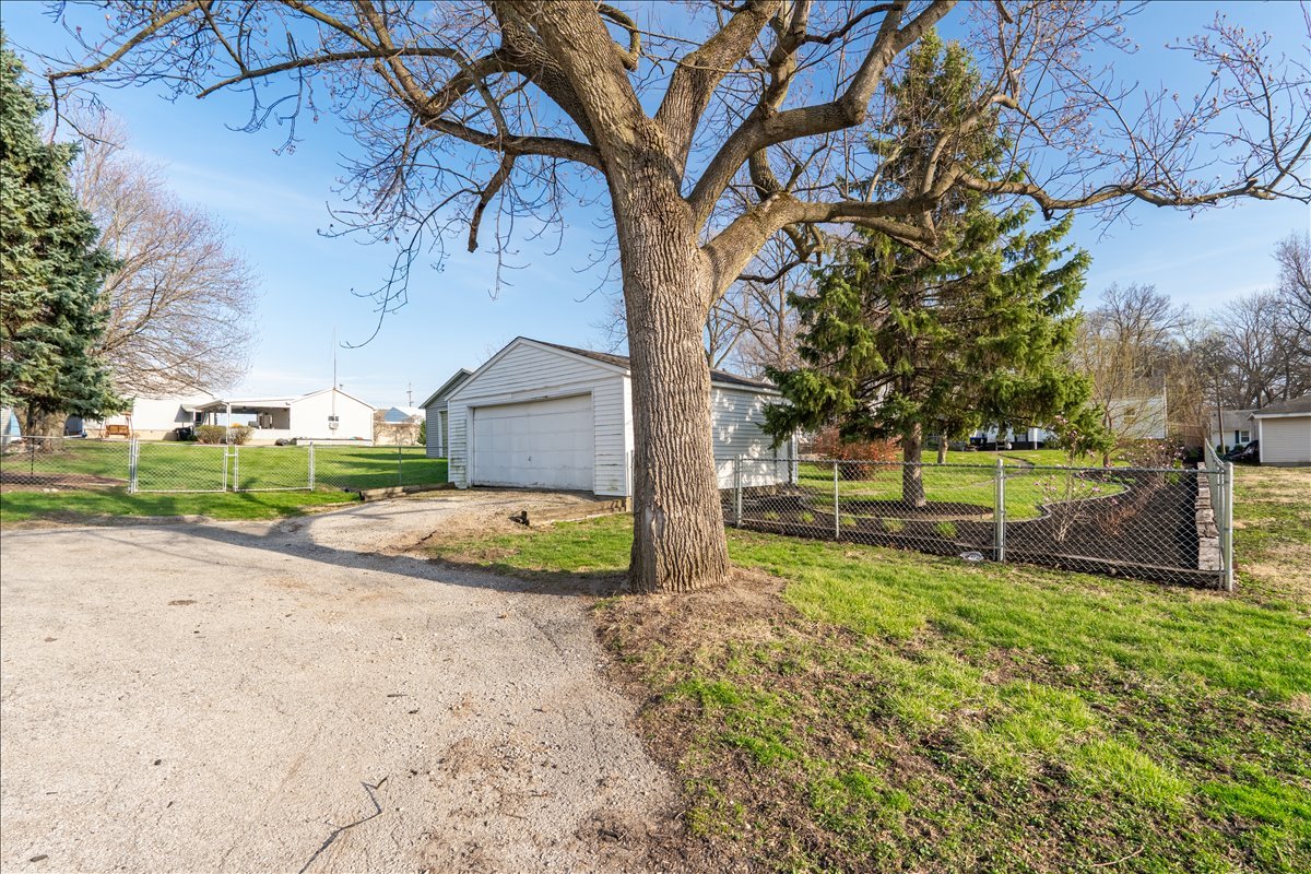 8 Felton Place Bloomington, IL 61701 - Photo 23 of 31 a view of a backyard with wooden fence