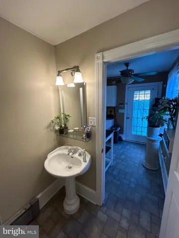 a view of a bathroom sink and a mirror
