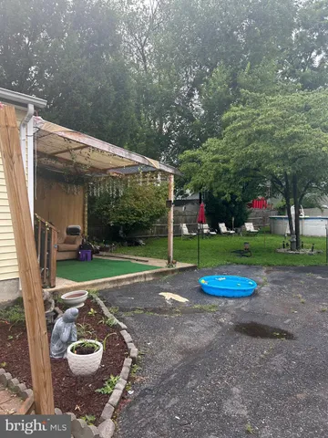 a childrens park with lots of swings and slides