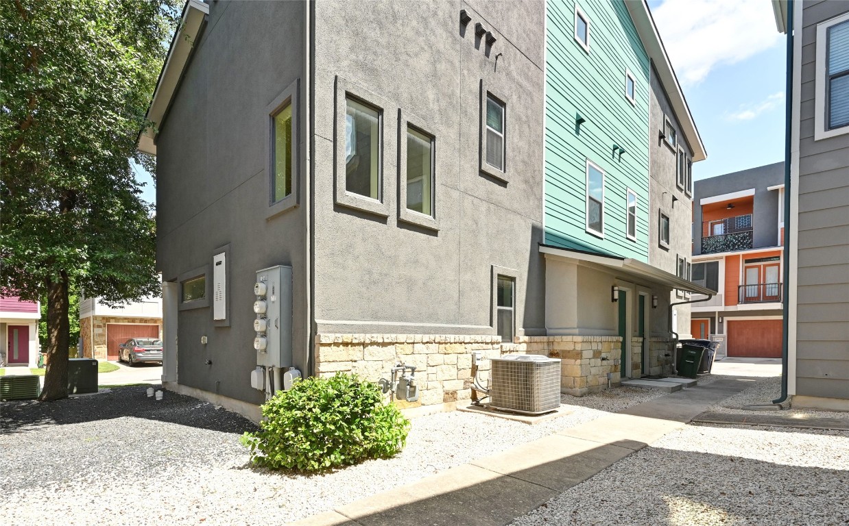 1504 Lorraine Loop, Unit B Austin, TX 78758 - Photo 24 of 25 a view of a building with many windows