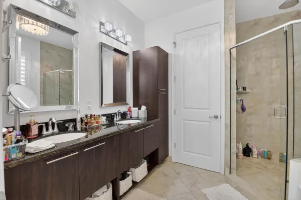 a white bath tub sitting next to a window