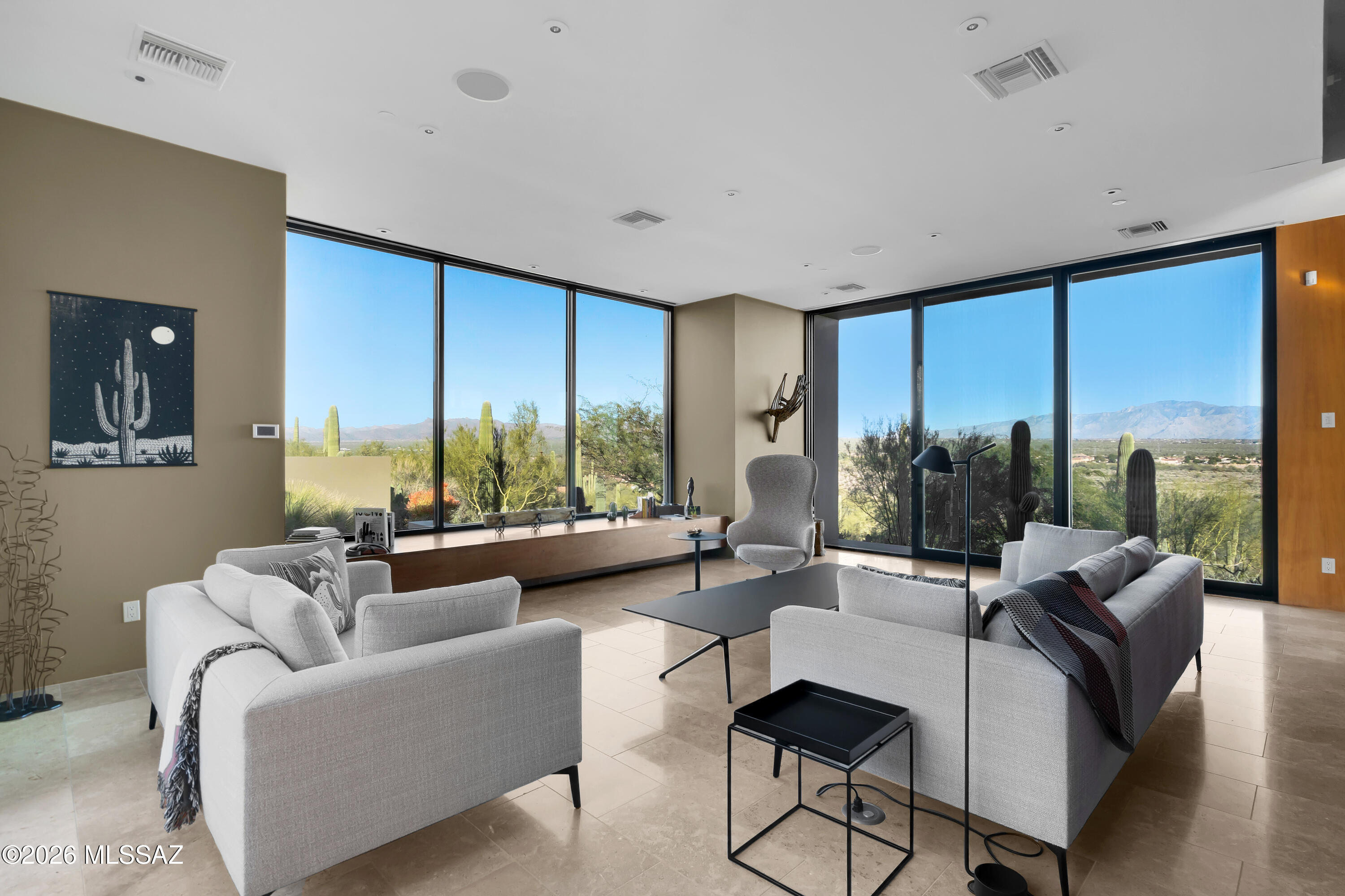 9971 North Silverbell Road Marana, AZ 85653 - Photo 12 of 34 a living room with furniture and a large window