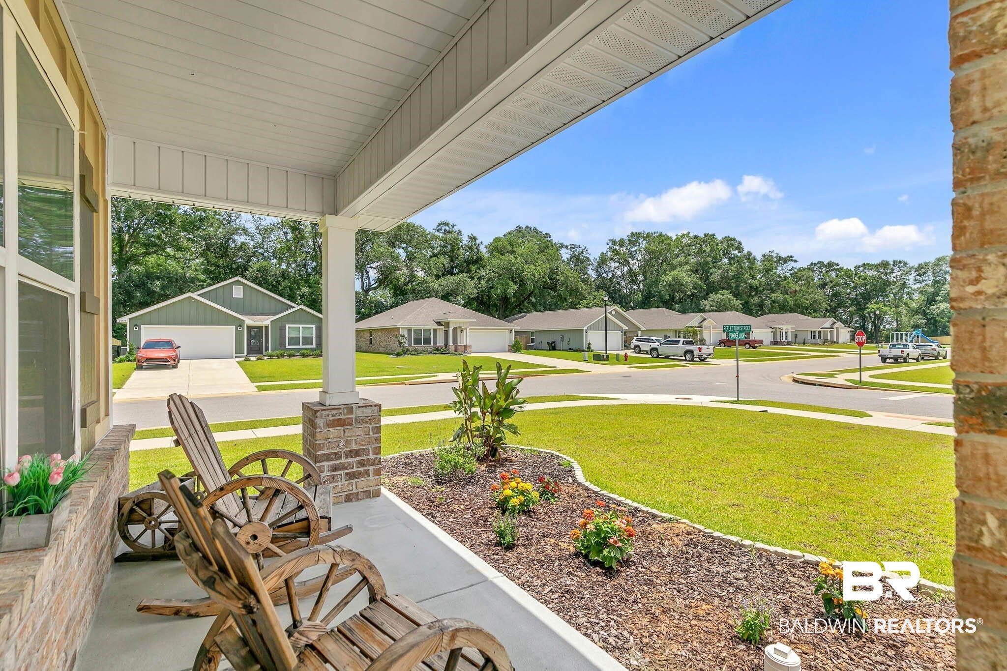 17217 REFLECTION Street Loxley, AL 36551 - Photo 83 of 83 This cali floorplan elevation has a front porch.