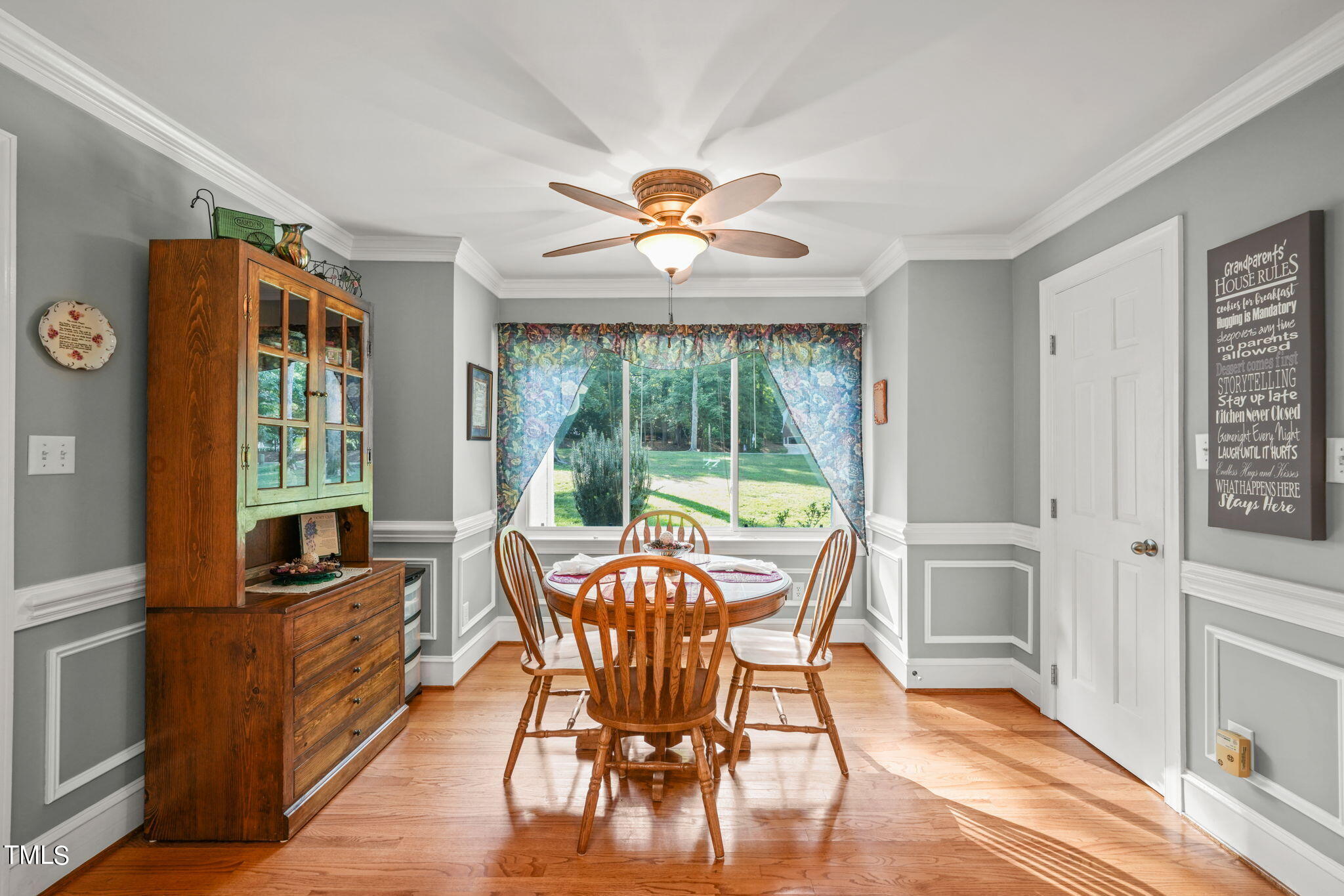 12717 Lindley Drive Raleigh, NC 27614 - Photo 26 of 45 a view of a dining room with furniture window and outside view
