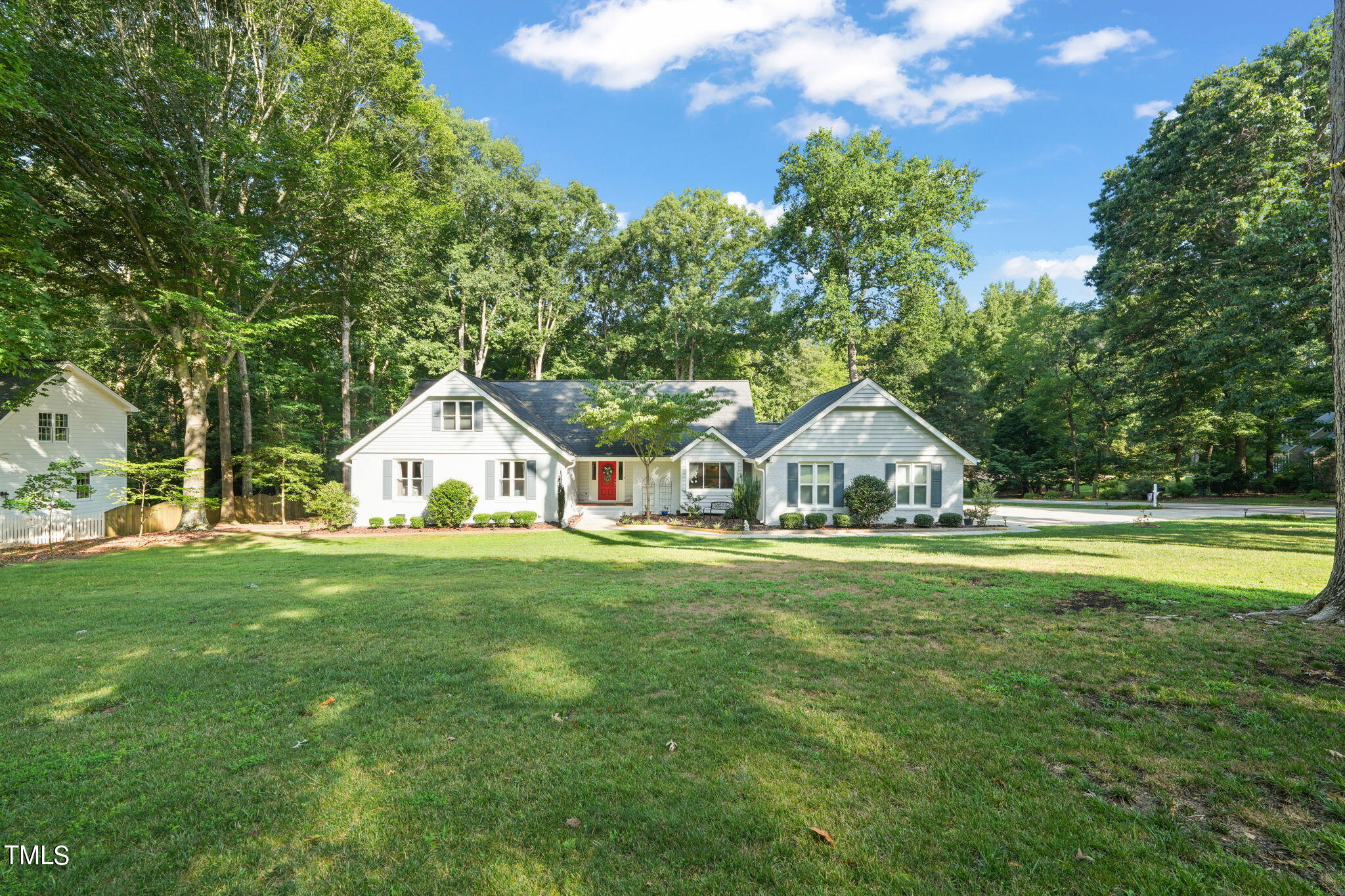 12717 Lindley Drive Raleigh, NC 27614 - Photo 43 of 45 a front view of a house with a yard and trees