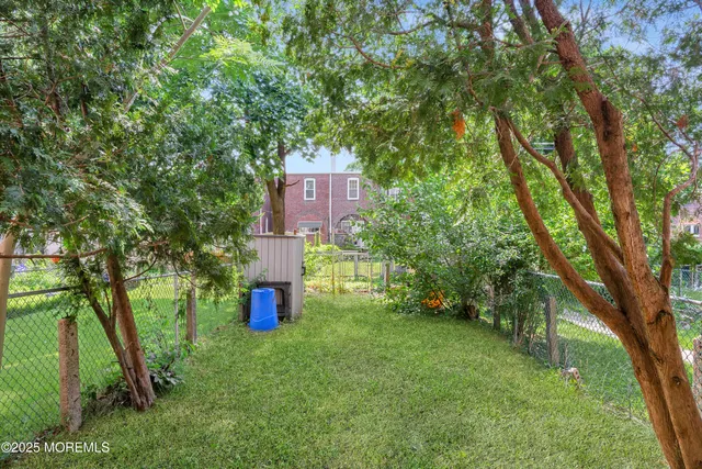 a fire hydrant in the middle of a forest