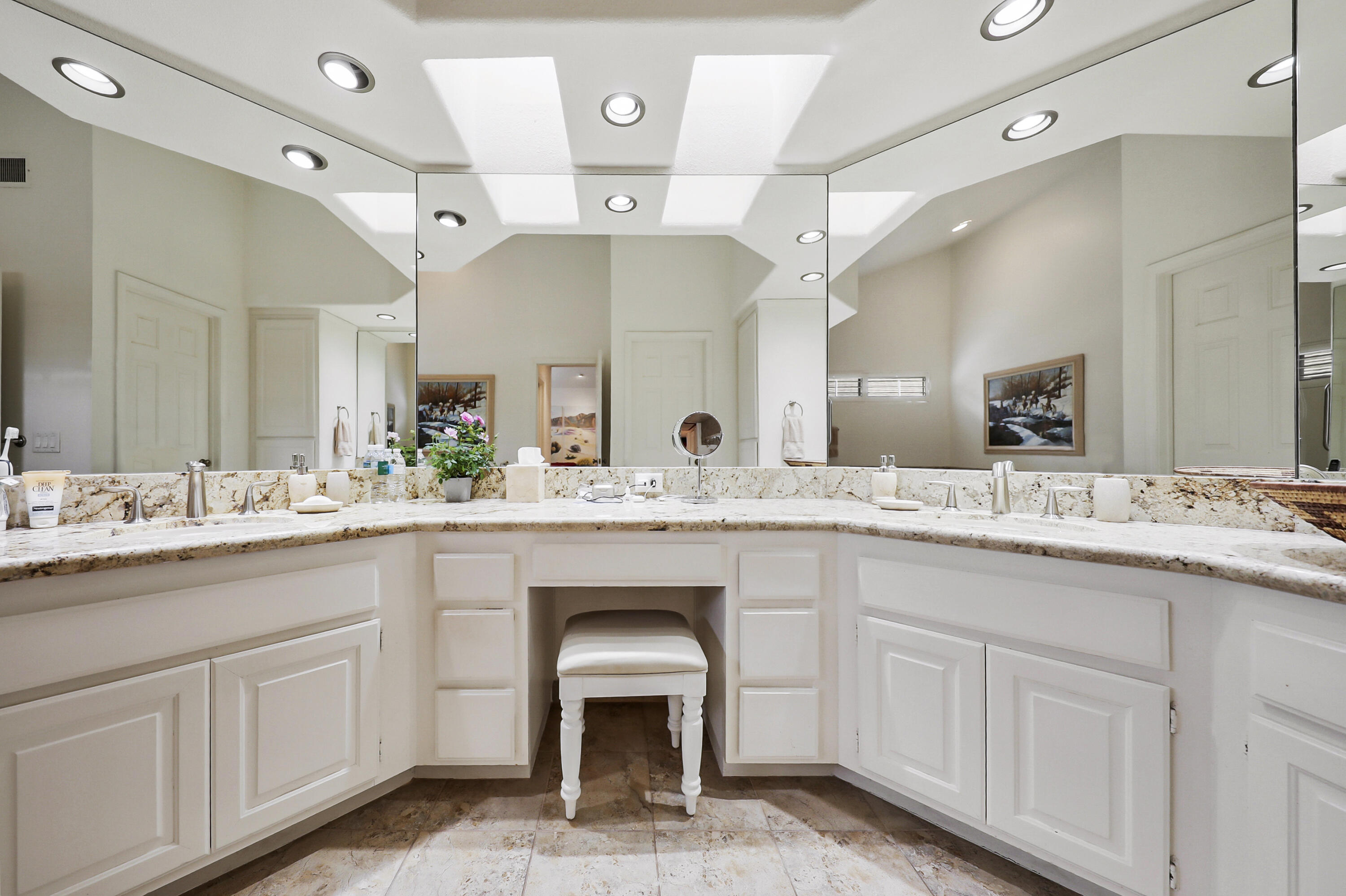 148 Deer Spring Way Palm Desert, CA 92211 - Photo 20 of 54 a bathroom with a sink and a mirror