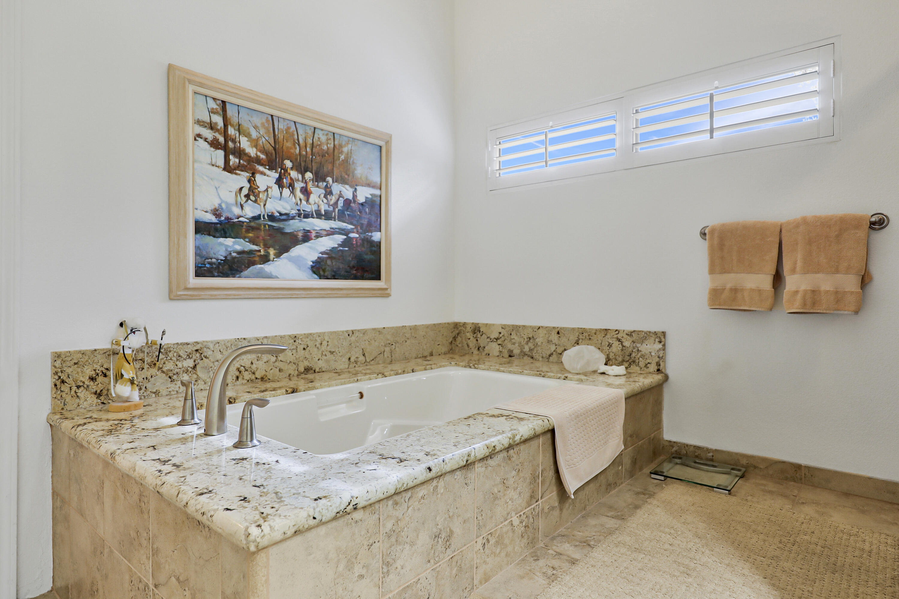 148 Deer Spring Way Palm Desert, CA 92211 - Photo 21 of 54 a bathroom with a granite countertop sink and a bathtub