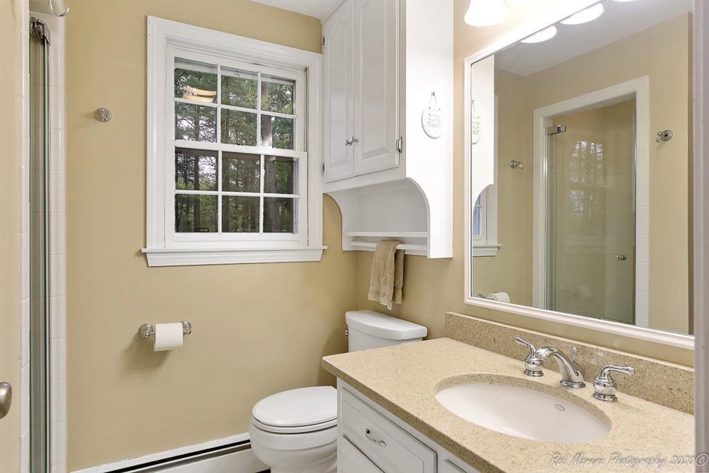 85 Bailey Road Andover, MA 01810 - Photo 20 of 36 a bathroom with a granite countertop sink toilet and shower