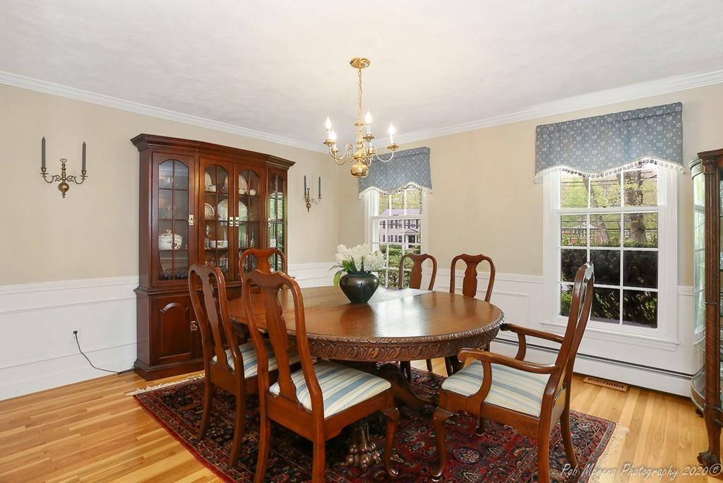 85 Bailey Road Andover, MA 01810 - Photo 4 of 36 a view of a dining room with furniture and wooden floor