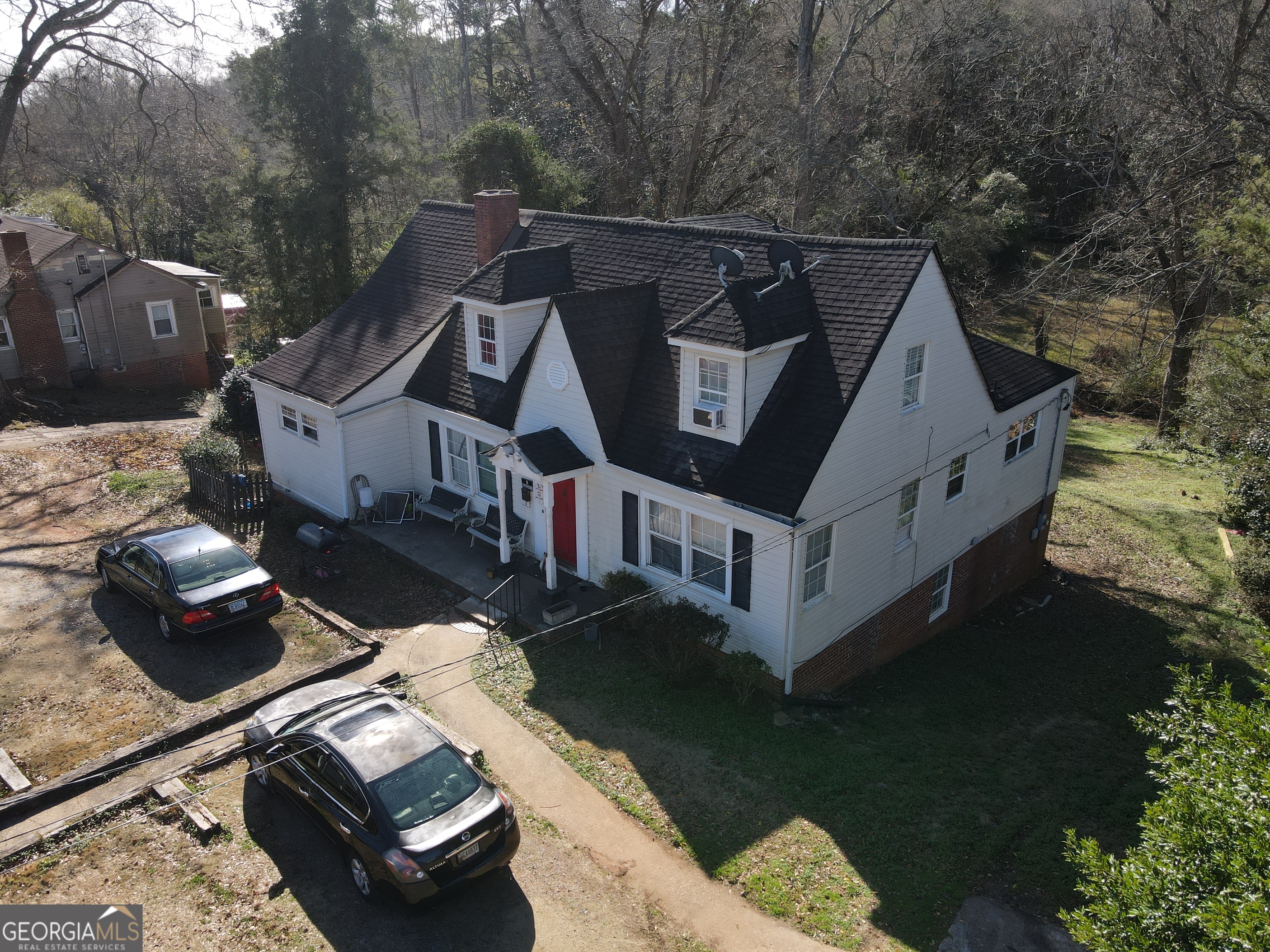 711 West Main Street Thomaston, GA 30286 - Photo 2 of 3 a view of a house with a yard