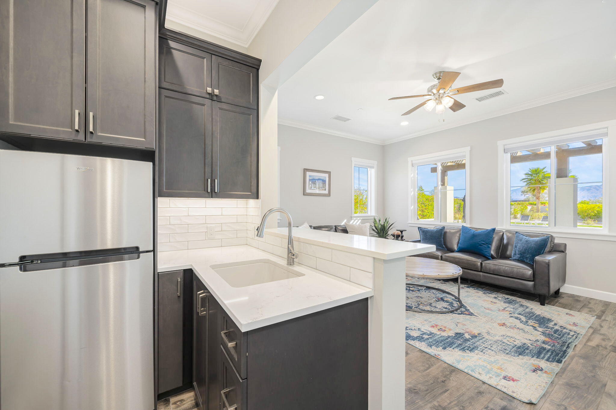 7 Siena Vista Rancho Mirage, CA 92270 - Photo 14 of 26 a living room with furniture and a table