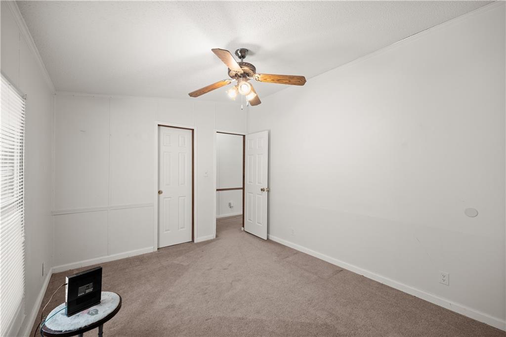 1000 Jim Johnson Road Northwest Winder, GA 30680 - Photo 19 of 37 a view of an empty room