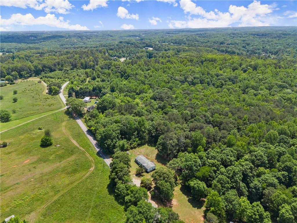 1000 Jim Johnson Road Northwest Winder, GA 30680 - Photo 34 of 37 a view of a yard with a house