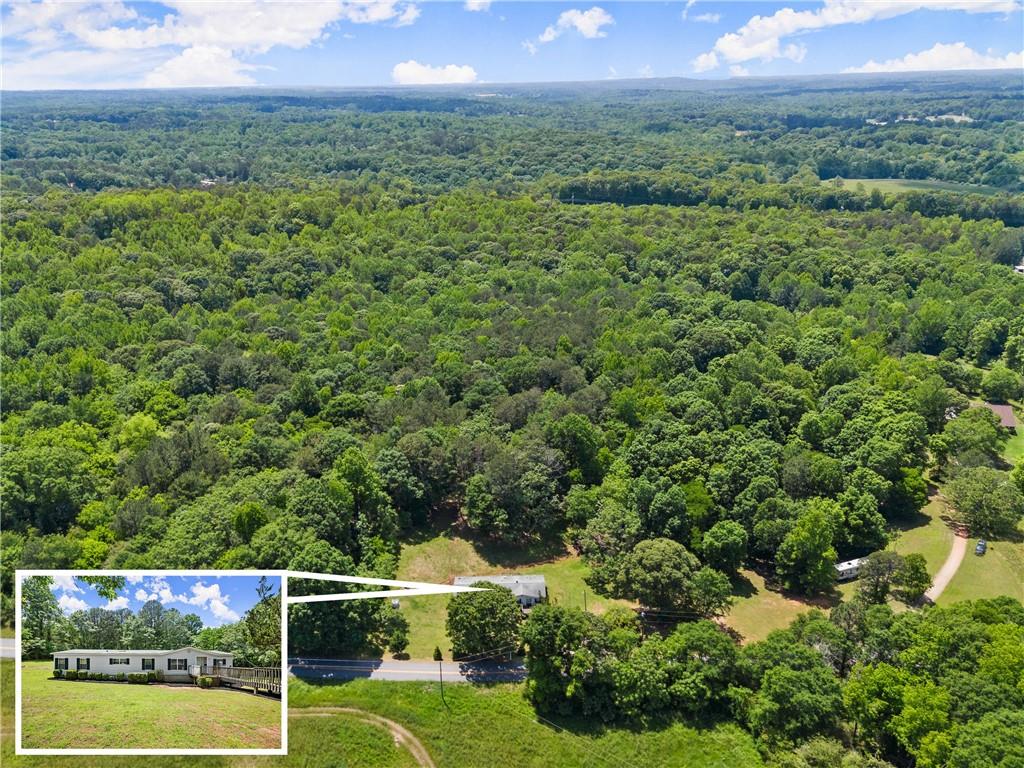 1000 Jim Johnson Road Northwest Winder, GA 30680 - Photo 36 of 37 a view of a lush green field