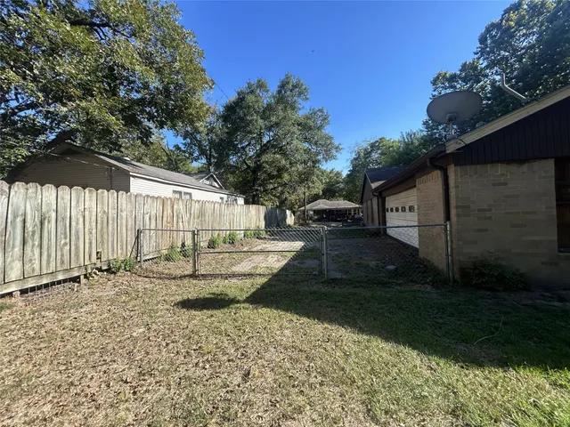 a view of a backyard with a garden