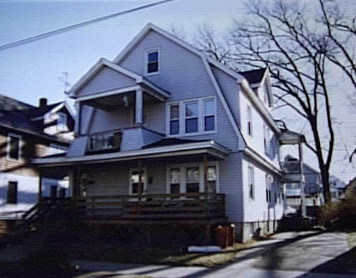 a front view of a house with yard