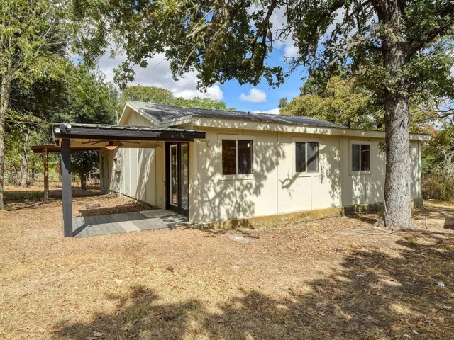 a view of a house with patio