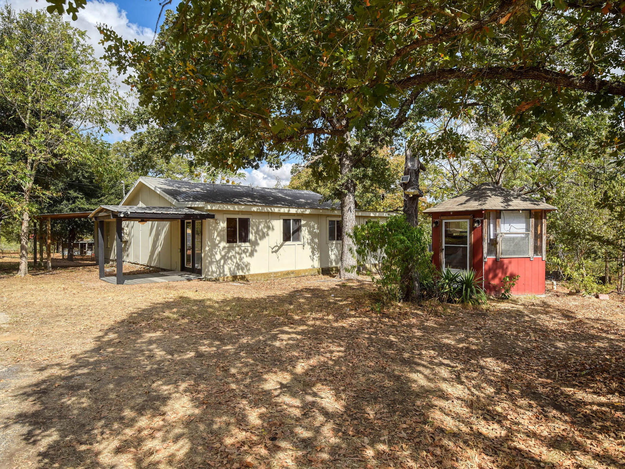176 Lacy Drive Elgin, TX 78621 - Photo 1 of 40 a view of a house with a yard