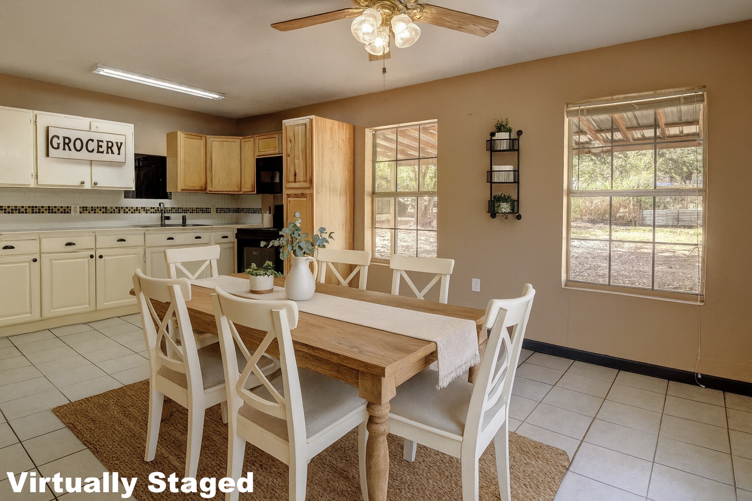 176 Lacy Drive Elgin, TX 78621 - Photo 15 of 40 a view of a dining room with furniture and a chandelier