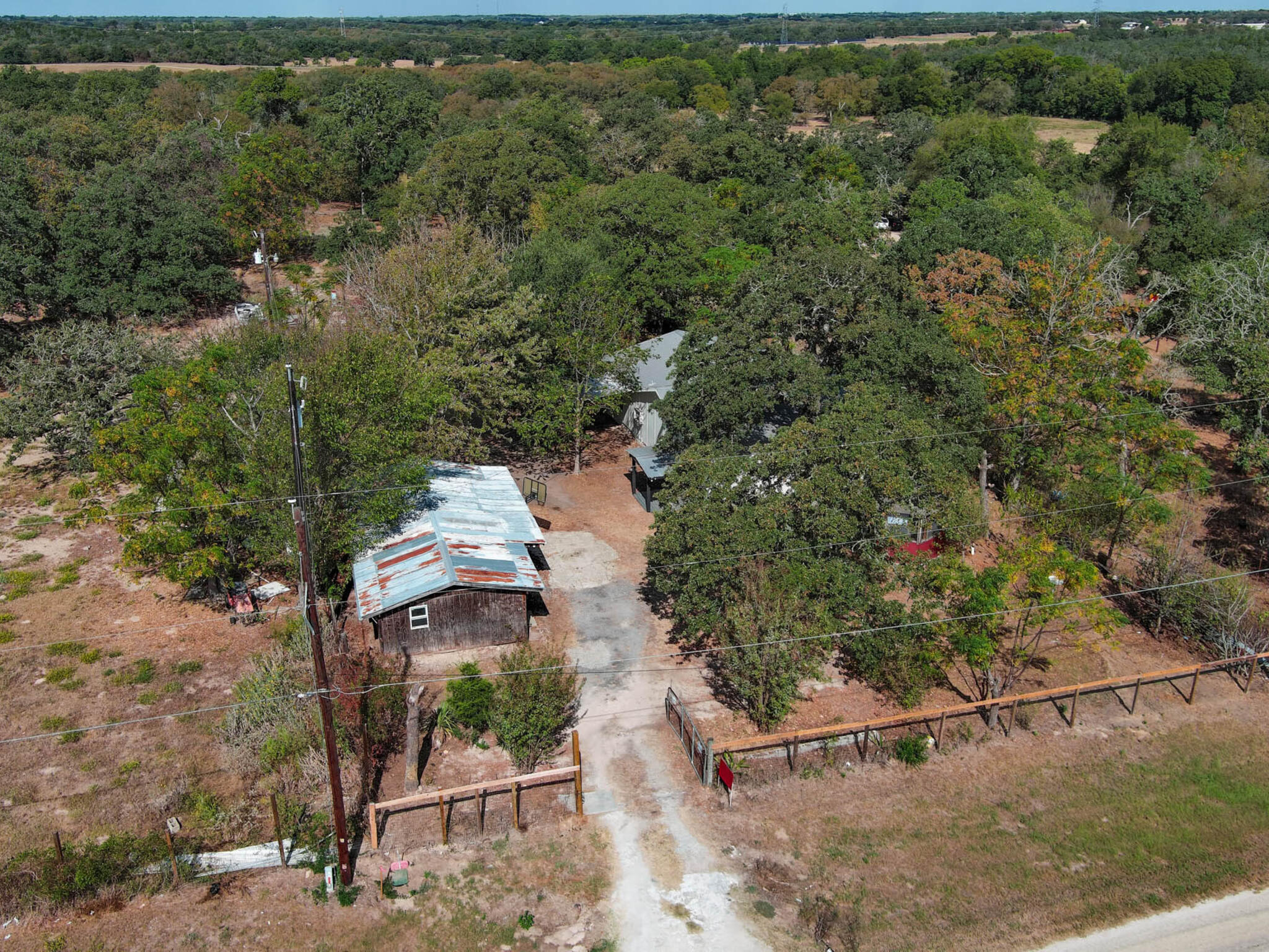 176 Lacy Drive Elgin, TX 78621 - Photo 2 of 40 an aerial view of a house with a yard