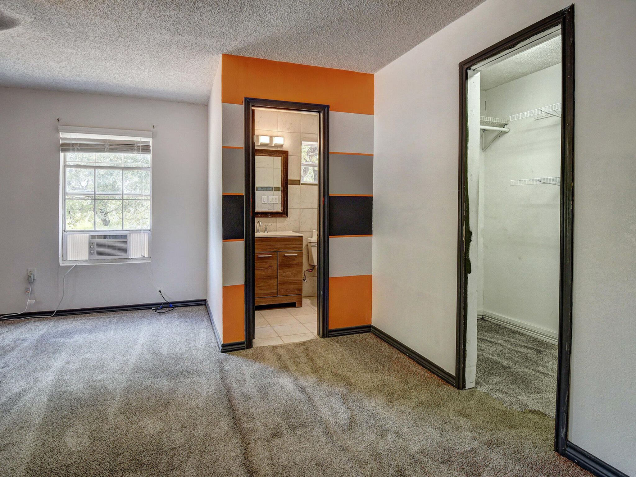 176 Lacy Drive Elgin, TX 78621 - Photo 21 of 40 an empty room with windows and closet