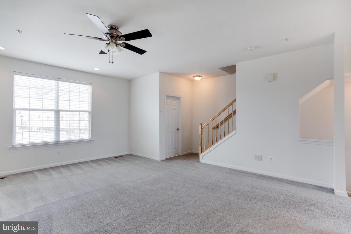 102 Backstretch Way Prince Frederick, MD 20678 - Photo 17 of 44 a view of an empty room with a window