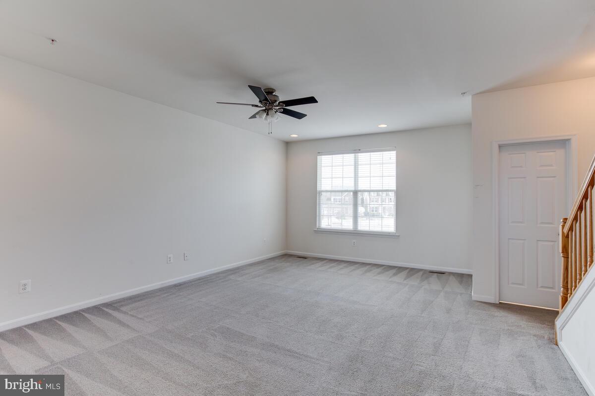 102 Backstretch Way Prince Frederick, MD 20678 - Photo 18 of 44 a view of empty room with ceiling fan