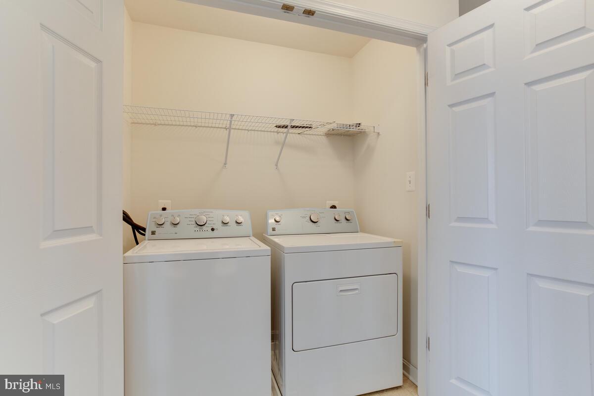 102 Backstretch Way Prince Frederick, MD 20678 - Photo 27 of 44 a utility room with dryer and washer