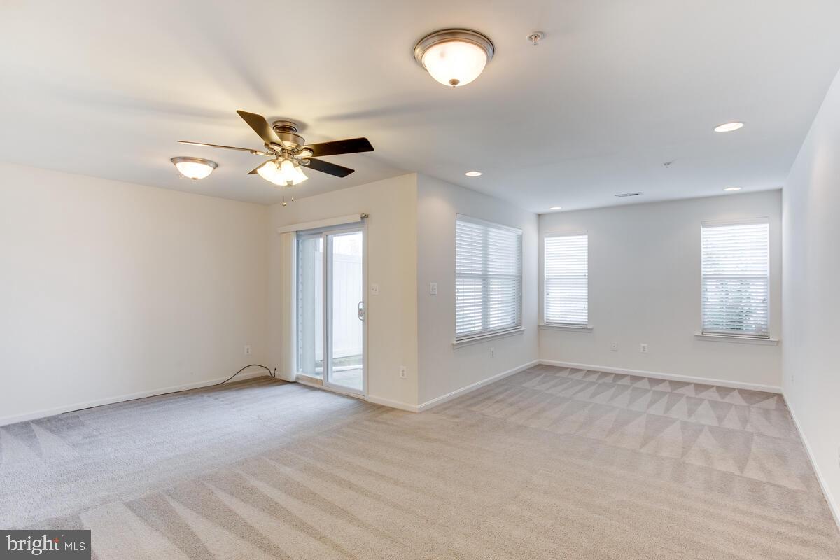 102 Backstretch Way Prince Frederick, MD 20678 - Photo 35 of 44 a view of an empty room with a window