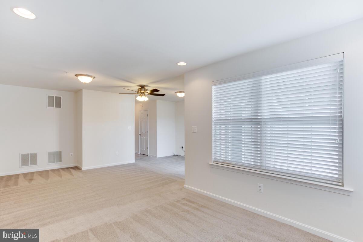 102 Backstretch Way Prince Frederick, MD 20678 - Photo 36 of 44 a view of an empty room with a window