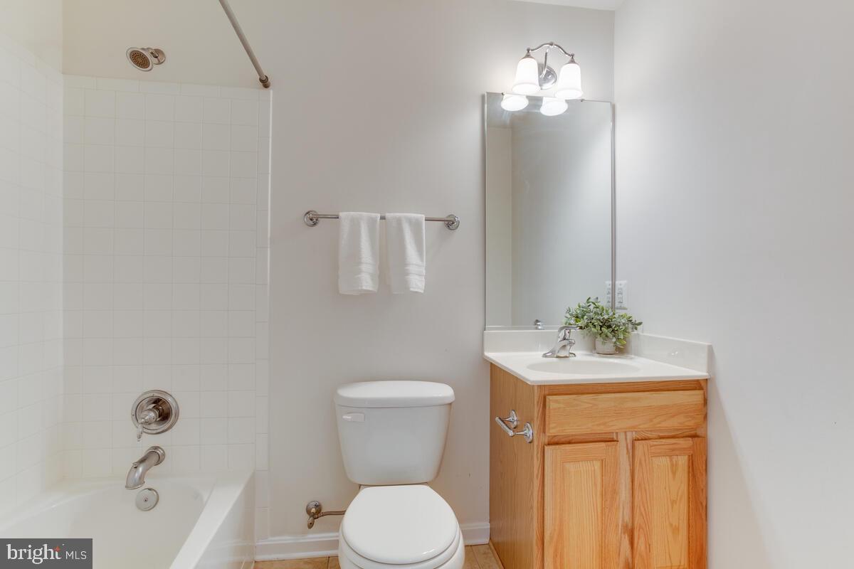 102 Backstretch Way Prince Frederick, MD 20678 - Photo 37 of 44 a white toilet sitting next to a bathroom sink