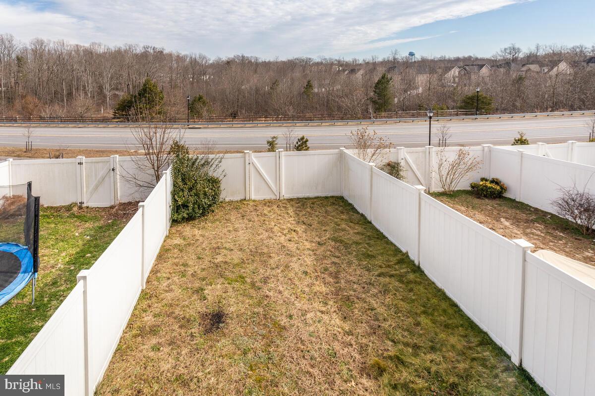102 Backstretch Way Prince Frederick, MD 20678 - Photo 40 of 44 a view of a swimming pool with a yard from a balcony