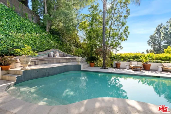 a view of a lake with a yard