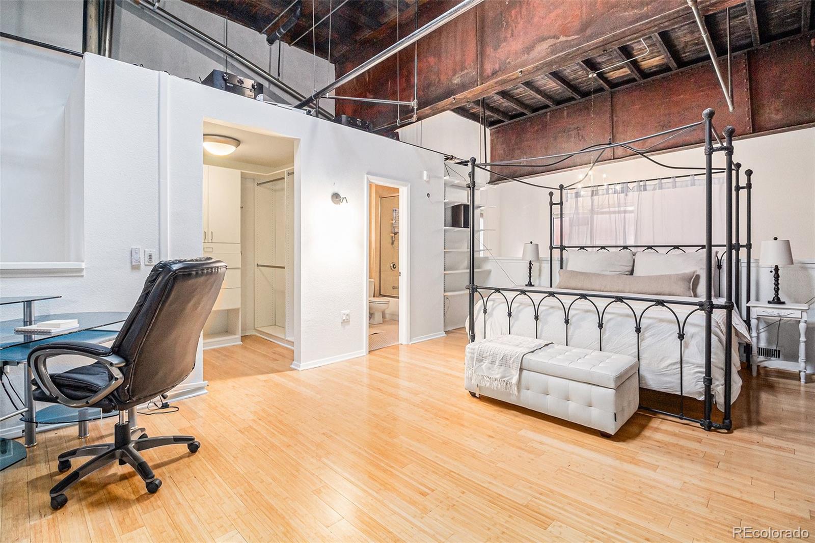 3225 Blake Street, Unit 24 Denver, CO 80205 - Photo 18 of 25 a view of workspace with couch