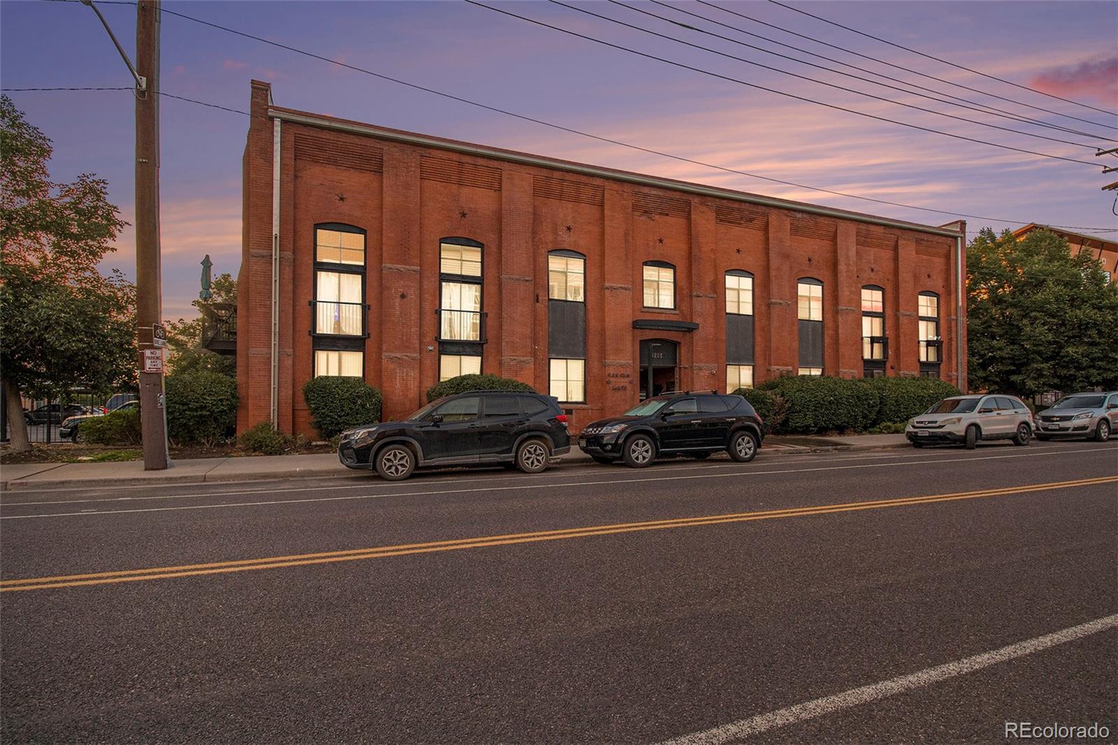 3225 Blake Street, Unit 24 Denver, CO 80205 - Photo 2 of 25 a view of a car parked in front of a building