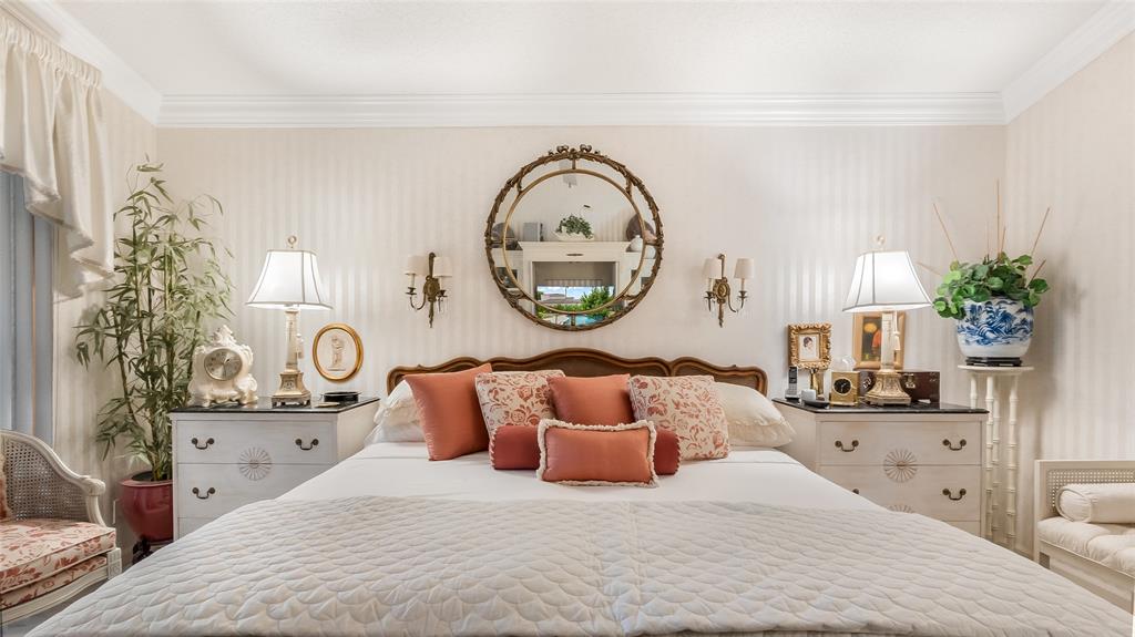 7844 Travelers Tree Drive Boca Raton, FL 33433 - Photo 18 of 40 a bedroom with a bed and a potted plant