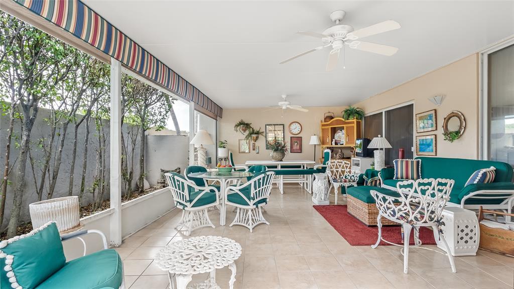 7844 Travelers Tree Drive Boca Raton, FL 33433 - Photo 29 of 40 a view of a dining room with furniture window and outside view