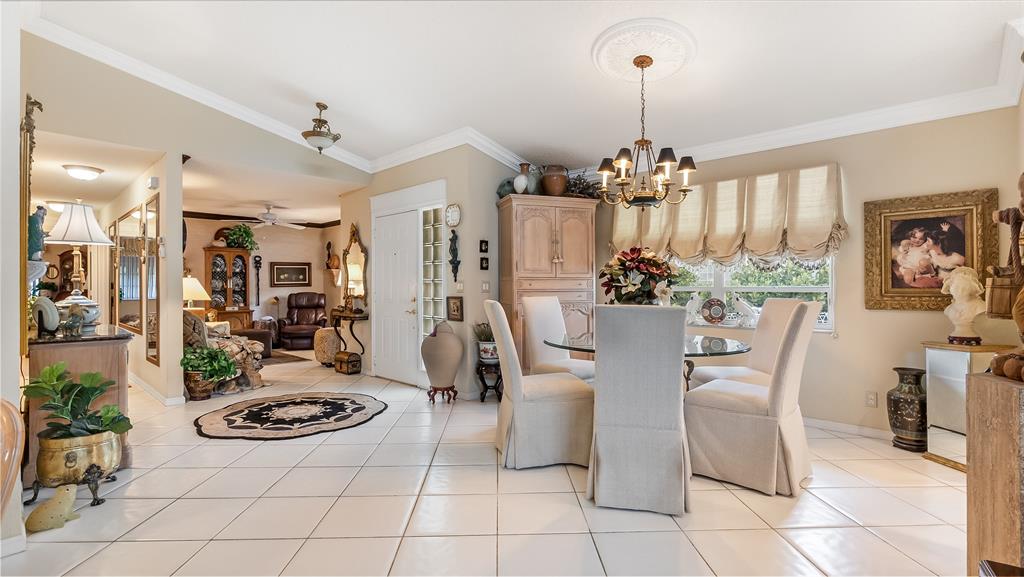 7844 Travelers Tree Drive Boca Raton, FL 33433 - Photo 8 of 40 a view of a dining room and livingroom view