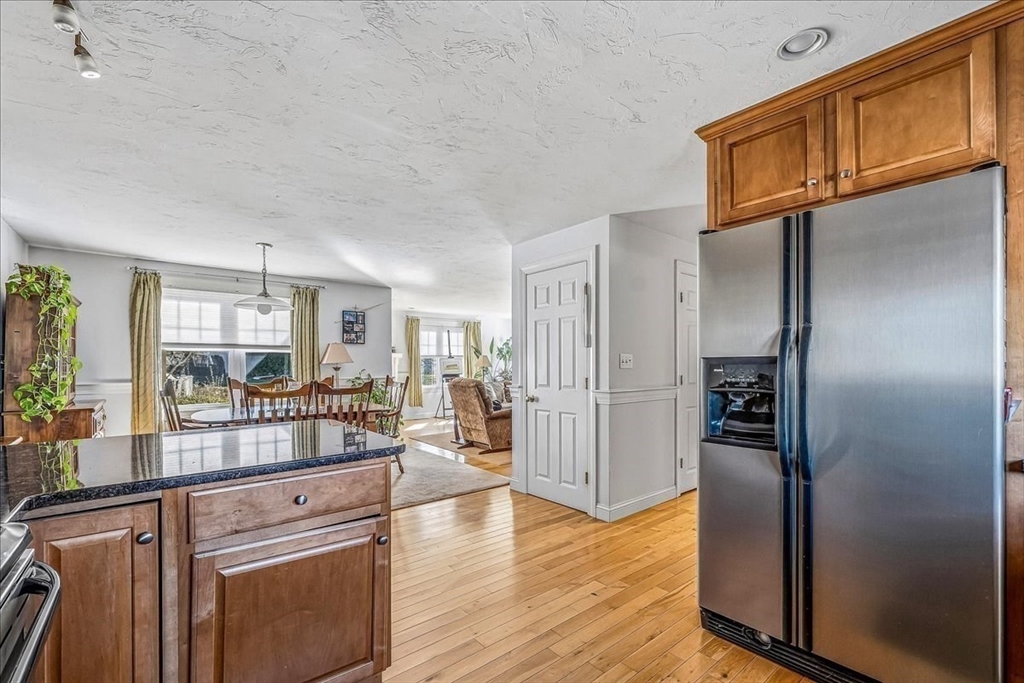 4 Old Field Road, Unit 4 Plymouth, MA 02360 - Photo 13 of 42 a kitchen with stainless steel appliances granite countertop a refrigerator and a stove