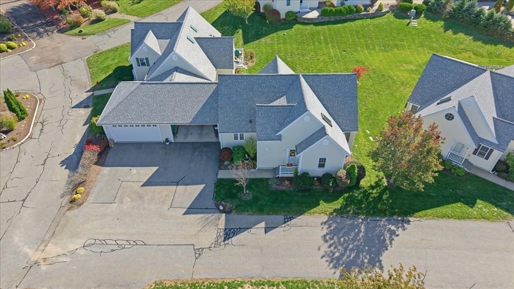 4 Old Field Road, Unit 4 Plymouth, MA 02360 - Photo 4 of 42 an aerial view of a house with garden space and a street view