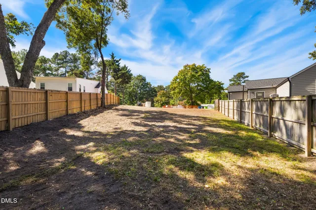 a view of backyard with green space