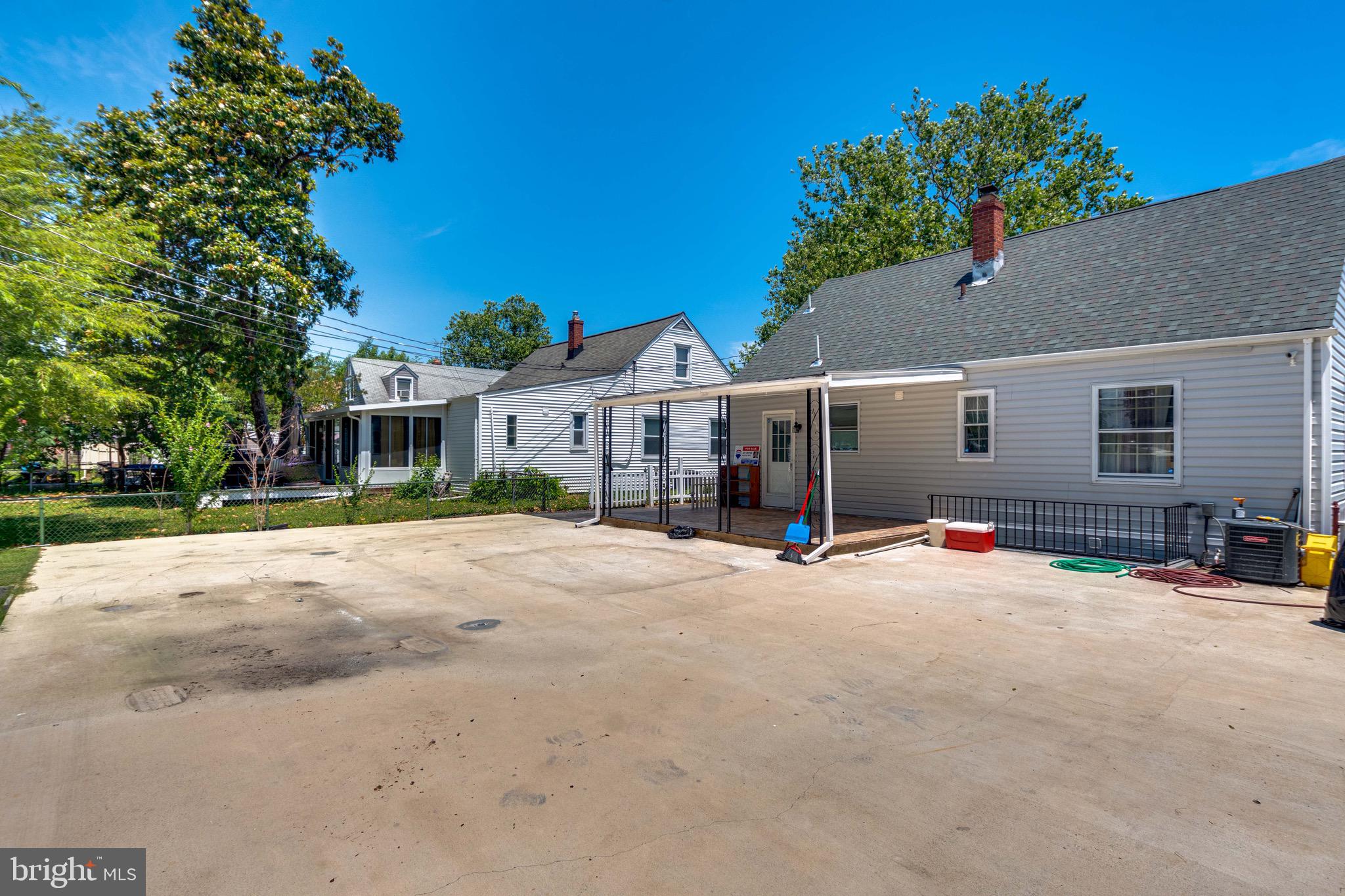 3414 Sollers Point Road Baltimore, MD 21222 - Photo 39 of 44 Backyard concrete patio and parking pad
